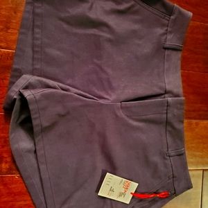 Elle shorts size 10 women They're sort of like a shiney denim color.